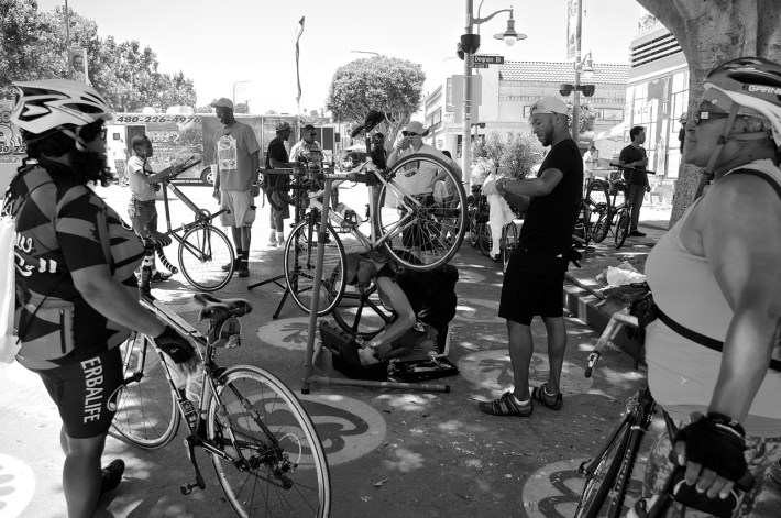 The founders of the Ride On! bike co-op and members of Black Kids on Bike gather in Leimert Park to host an open-air tune-up session. Sahra Sulaiman/Streetsblog L.A.