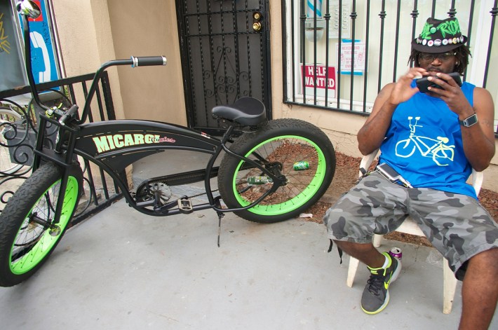 Ervin "EJ" Bromell and his bike relax outside the new co-op space. Sahra Sulaiman/Streetsblog L.A.