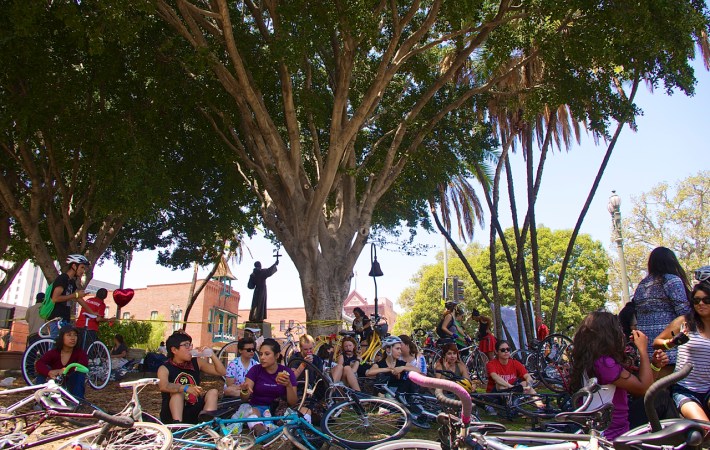 Riders gather in the shade just east of Olvera St. Sahra Sulaiman/Streetsblog L.A.