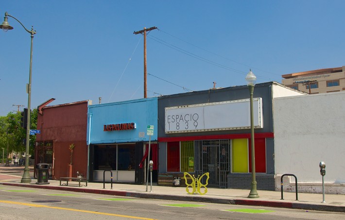 The landscape in front of Espacio 1839 now includes a surplus of bike racks, including one that is largely unused. Sahra Sulaiman/Streetsblog L.A.
