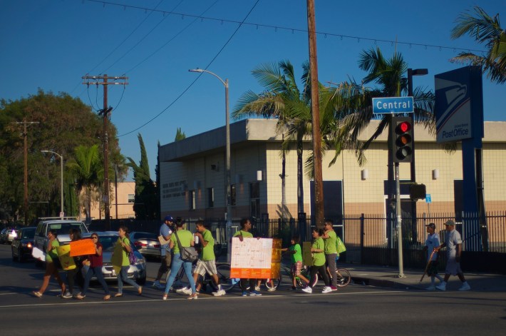 Members of the South Central community head for the CD9 Constituent Center chanting in favor of safe streets and bike lanes. Sahra Sulaiman/Streetsblog L.A.