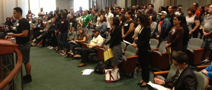 Metro board meeting attendees stand in support of Supervisor Hilda Solis motion directing Metro to broaden 710 Freeway South studies. Photo: Joe Linton/Streetsblog L.A.