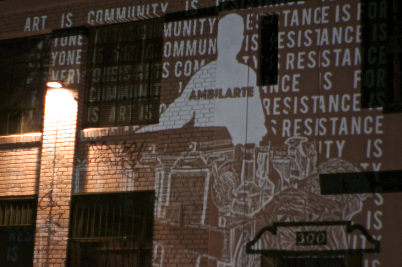"Art is Community; Art is Resistance" is projected on the wall of Michele Maccarone's new gallery space on Mission Road in Boyle Heights. Sahra Sulaiman/Streetsblog L.A.