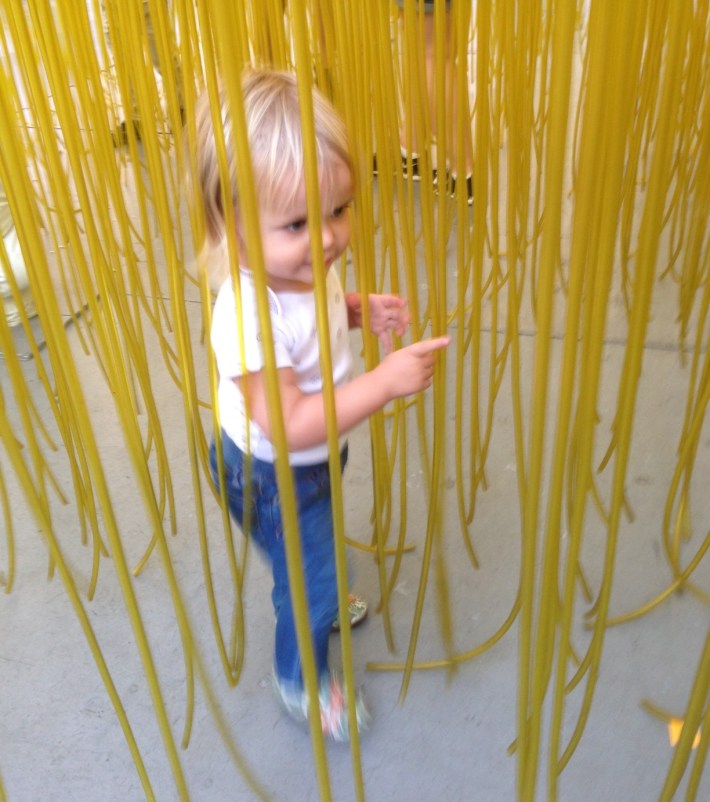 Maeve really enjoys the "yellow spaghetti" sculture at LACMA.