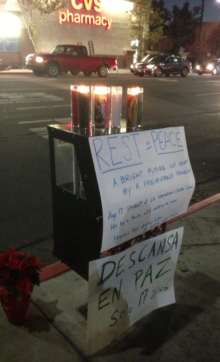 Signs at last night's vigil for Andres Perez. Photo: Joe Linton/Streetsblog L.A.