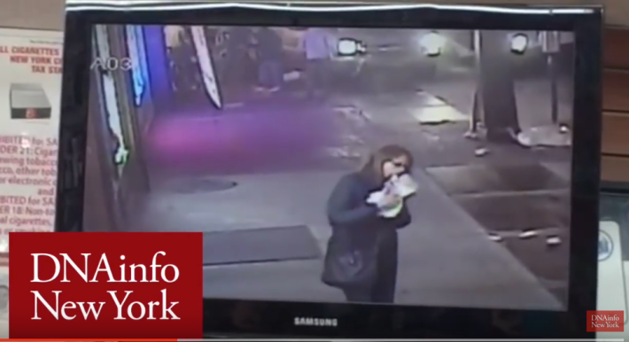The success of Vision Zero hinges on us, as a society, pledging not to be the equivalent of this lady: someone who is too focused on her own needs (eating pizza) to care about the safety of others. Screenshot of video found at DNAinfo.com
