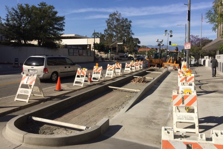 Construction underway on Los Angeles Street protected bike lane. Photo by Joe Linton/Streetsblog L.A.