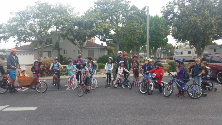 I presented to the kinders on Bike to School Day. Over half of them biked to school that day. Usually the total cyclists is one. This picture is from the Park and Bike event we hold before school for the commuter students to participate.