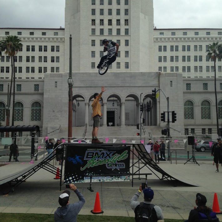 A BMX performer jumps over the second tallest bike advocate I know. All six pics: Damien Newton