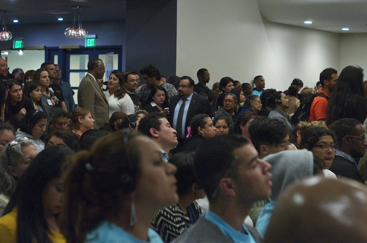 Ninth District Councilmember Curren Price (standing center left, brownish jacket) turned the packed-to-the-hilt town hall over to union representatives and representatives of the "creative habitat" known as the Reef after his opening remarks. Sahra Sulaiman/Streetsblog L.A.