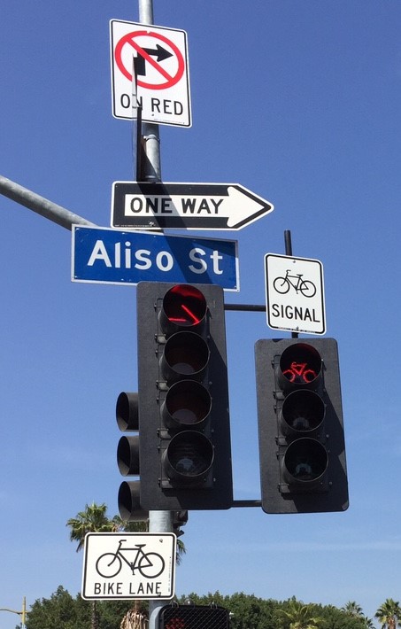 Bicycle traffic signal to allow cyclists a separate phase from turning cars