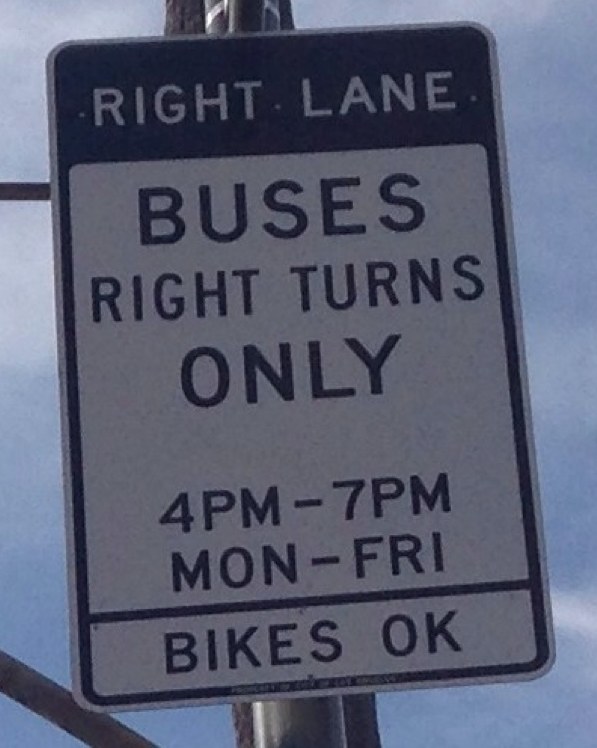 Los Angeles bus-only lane signage. The bottom line states "BIKES OK" Photo: Marc Caswell