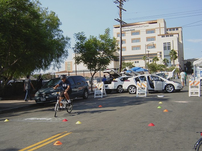 A youth tries out the obstacle course set up by Multicultural Communities for Mobility. Sahra Sulaiman/Streetsblog L.A.