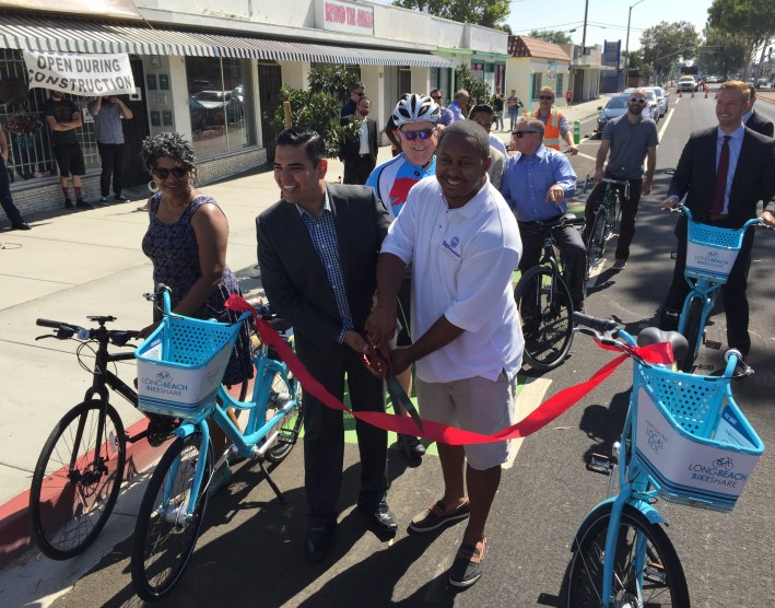 Garcia and Richardson cut the ribbon on the Artesia protected bike lanes