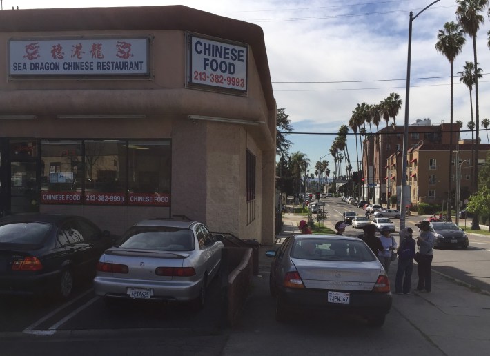 Another car on a Koreatown sidewalk today