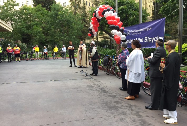Praying for bicyclist safety at the 2017 Blessing of the Bicycles