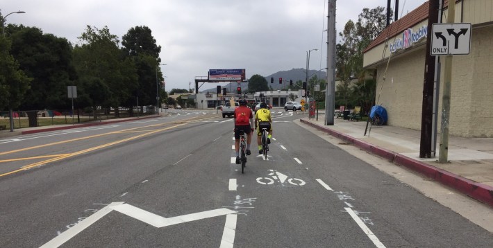 In some merge zones, the Foothill Boulevard protected bikeway becomes a buffered or dashed bike lane