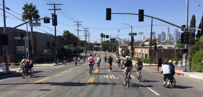 Riders heading downhill on Fourth Street in Boyle Heights