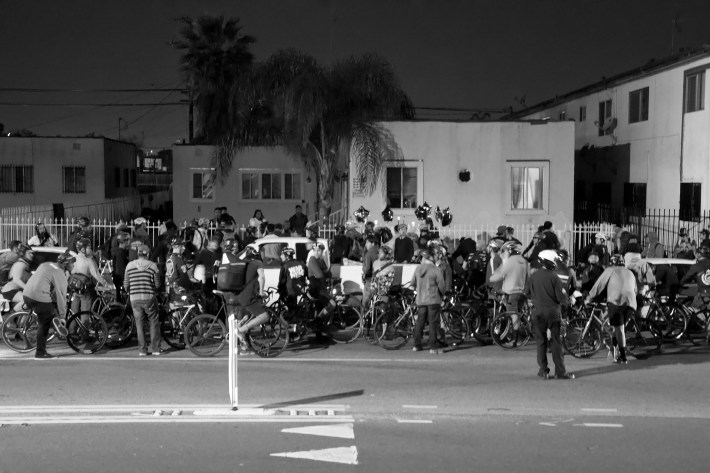 Riders gather at the home of Frazier's mother to pay their respects. Sahra Sulaiman/Streetsblog L.A.