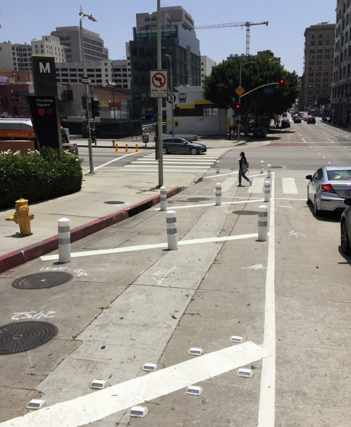New painted curb extension on 4th Street at Hill Street