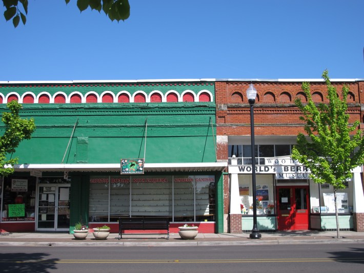 Brightly painted buildings were seen as cause for consternation for some in Woodburn's Anglo community. Photo: Monique López