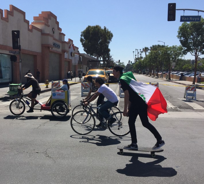 Skateboarder, cyclists and pedi-cab at yesterday's CicLAvia the Valley