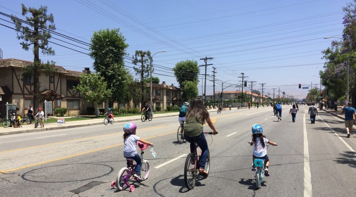 Families enjoying CicLAvia on Van Nuys Boulevard