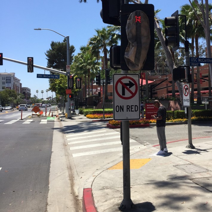 Covered bicycle signal on MyFigueroa