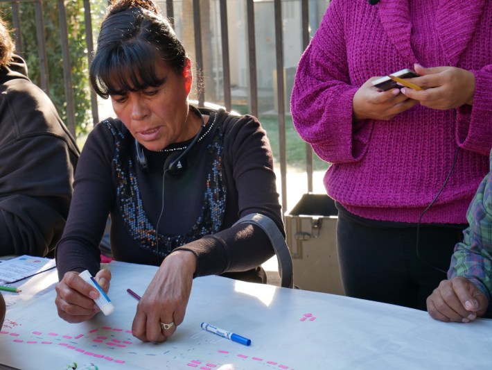 Vendors map out potential alternative configurations that allow for greater population of the plaza space. Photo: Monique López