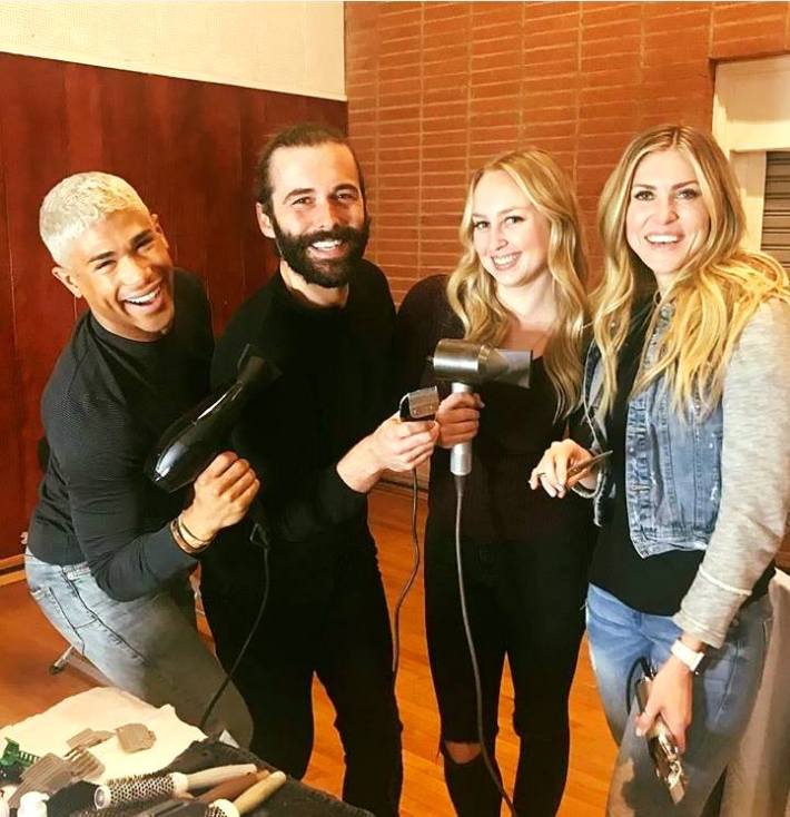 Some of the city's hair stylist volunteers pose following Homeless Connect Day. One of them may look familiar to people with AMC or Netflix.