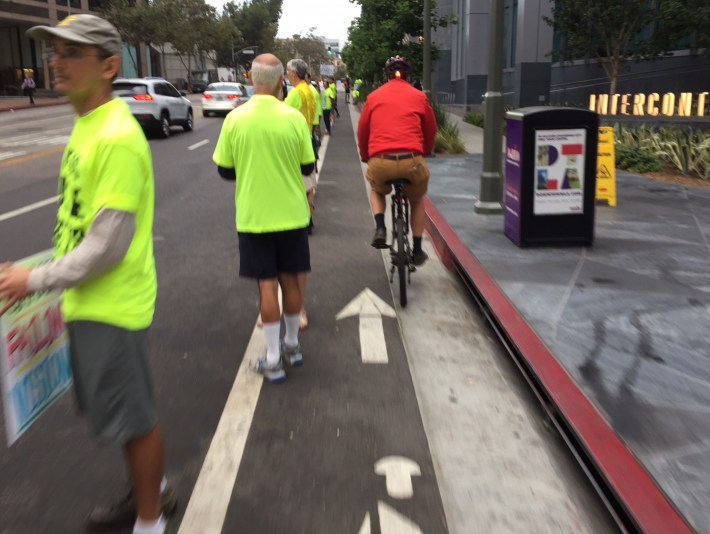 This morning's people-protected bike lane protest in front of the InterContinental hotel on 7th Street