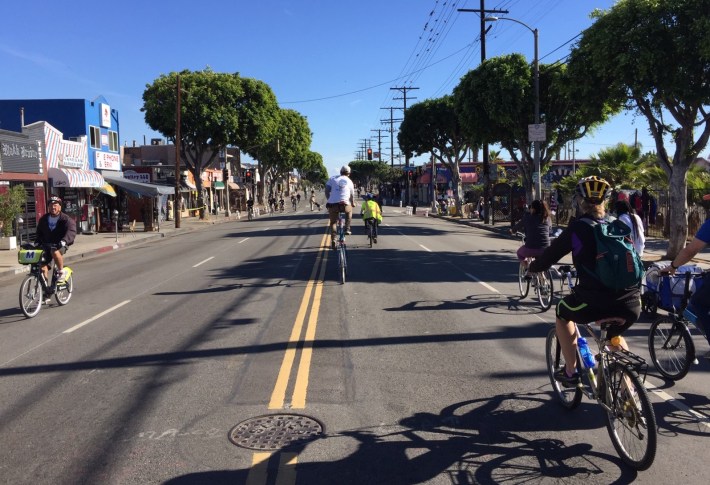All kinds of bikes, including tall bikes, along the CicLAvia route