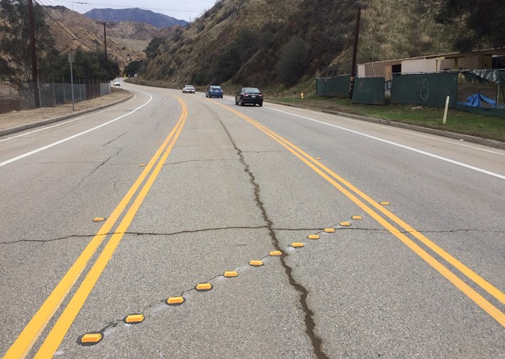 In many areas, LADOT added center median space, including raised reflectors which act as a sort of rumble strip to discourage unsafe passing