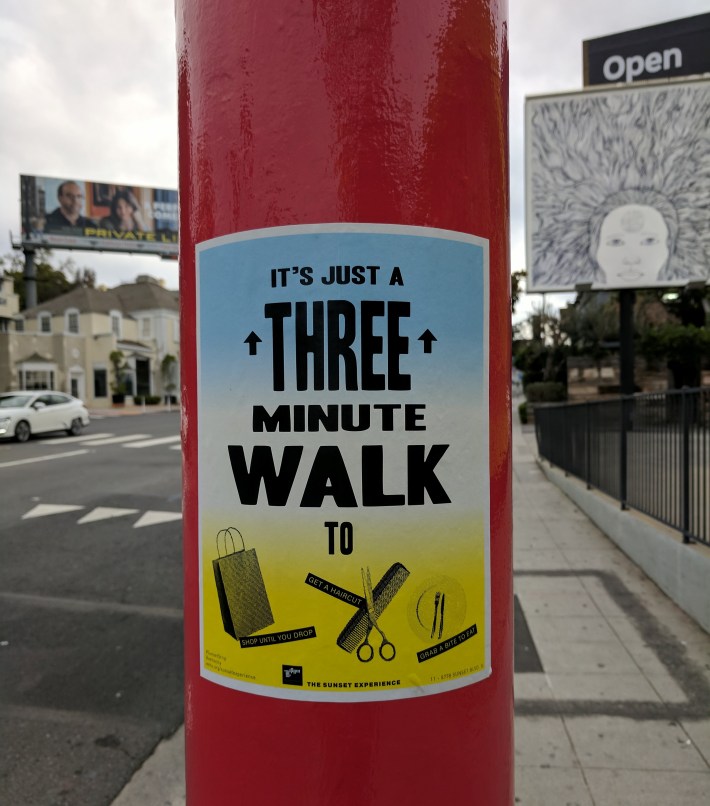 Pedestrian-oriented signage on existing poles
