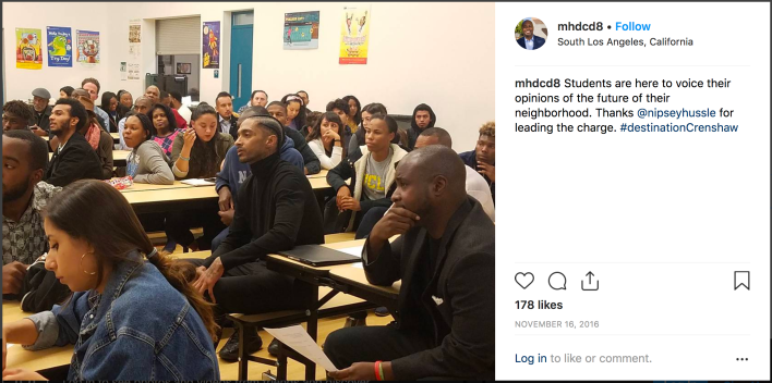 Nipsey Hussle (at center) and Councilmember Marqueece Harris-Dawson (at right) meet with students to talk Destination Crenshaw and the future of the community. [Click image to visit the original Instagram post]