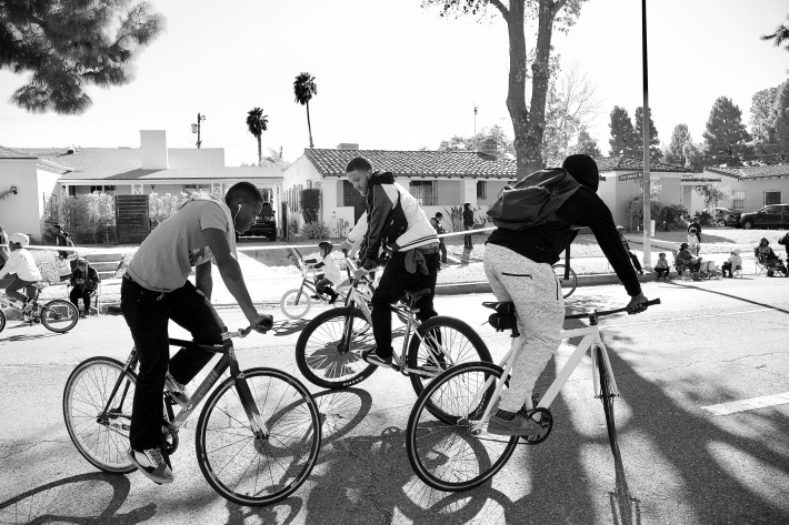 Cortez (at left) competes to see who can hold a track stand the longest. Sahra Sulaiman/Streetsblog L.A.