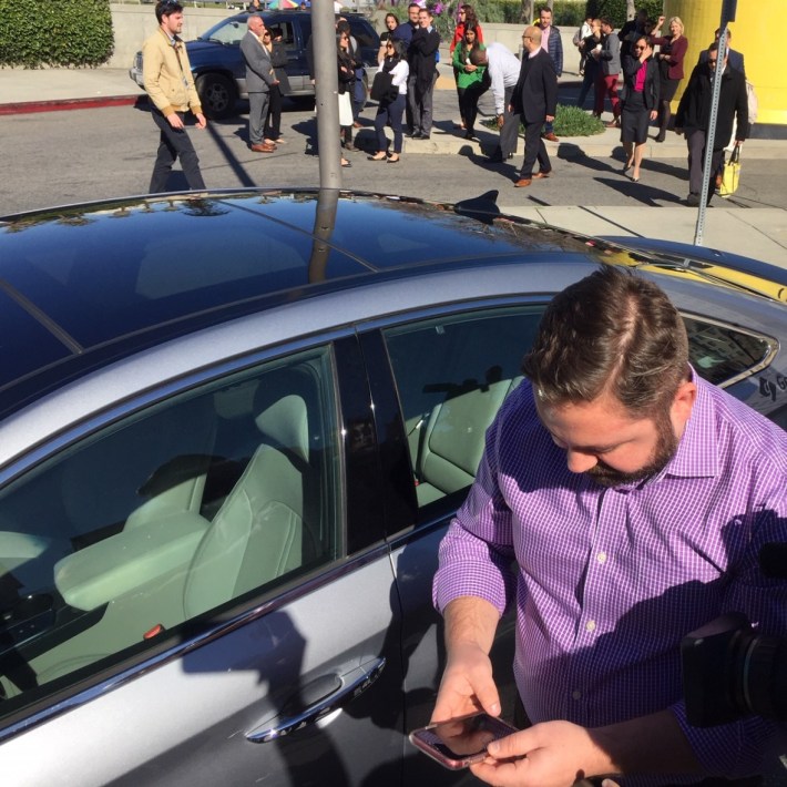 Getaround's Correa demonstrates using the app to unlock the car