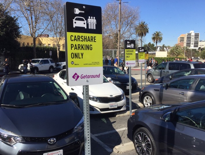 Getaround car-share cars parked at reserved spots at MacArthur Park Red/Purple Line station