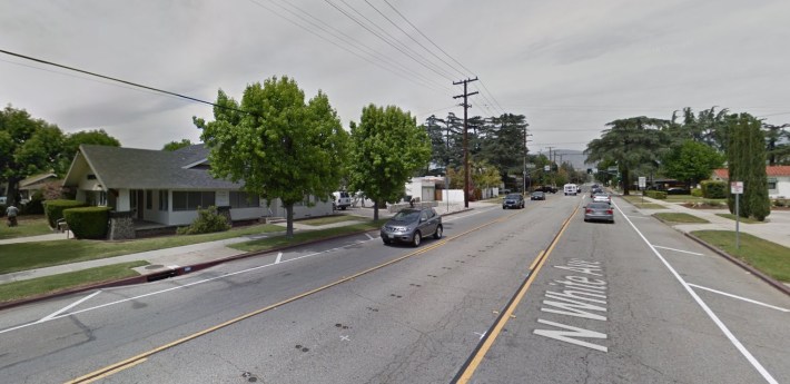 White Avenue in Historical Old Town La Verne, where the Gold Line Authority is planning to remove parkways to widen to two car lanes in each direction. Image via Google Maps