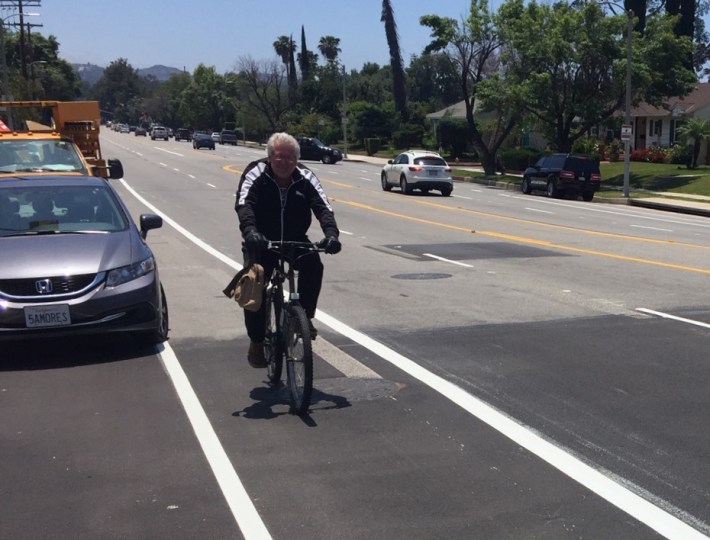 Cyclist riding in the new Winnetka Avenue bike lane