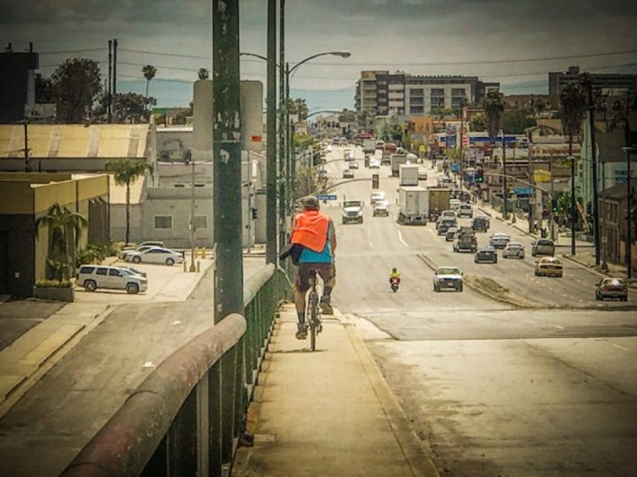 Bicyclists and pedestrians face dangerous conditions trying to cross main arterials from West Long Beach and over the 710, as seen here. Photo by Brian Addison.