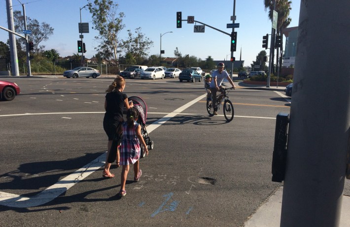 Parents with kids crossing Overland