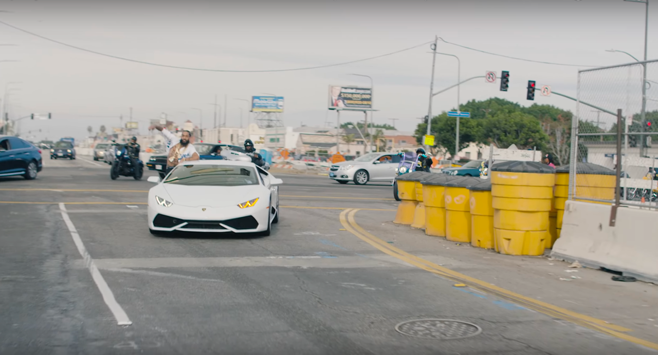 Crenshaw Line construction materials make a cameo as Hussle rounds the corner at Crenshaw and Slauson in the video for "Last Time that I Checc'd." Torn up sidewalks and streets, fencing in front of businesses, street closures, and more have vexed residents for years.