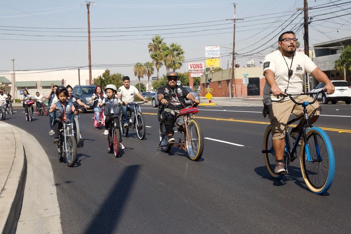 Carlos Molina of (far right) helps lead the riders through