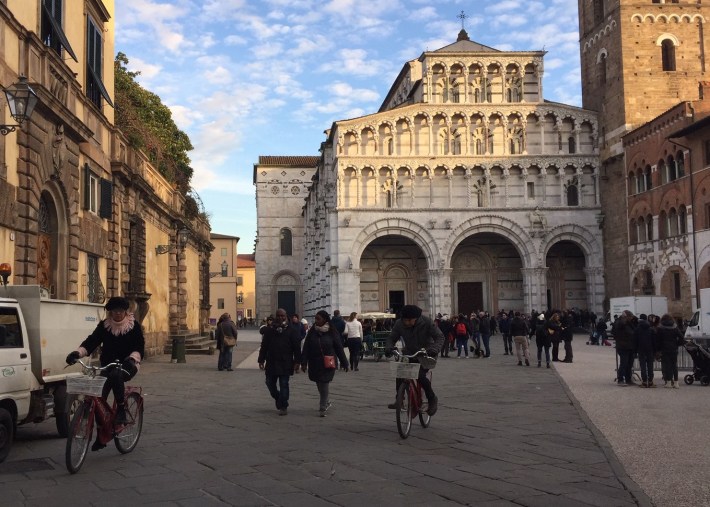 Cyclists sharing pedestrian space - in Lucca