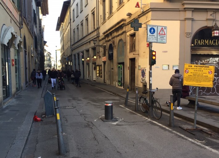 Bollard blocking drivers from street in Florence