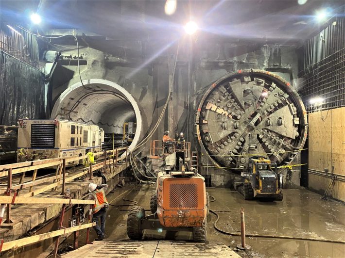 Metro projects under construction will continue under Metro's COVID budget, but delays are anticpated on other projects. Purple Line Extension section 1 tunnel machine photo via Metro