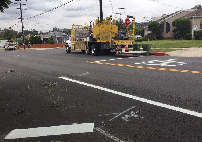 L.A. City crews applying thermoplastic paint striping on York Boulevard today