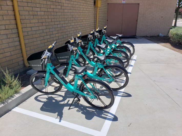 GoSGV e-bikes parked at one of the virtual hubs across from the South El Monte Center. Bikes parked outside of a designated hub incur a $5 fee. Kristopher Fortin/Streetsblog LA
