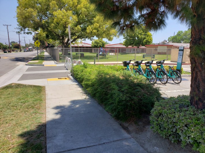 GoSGV e-bikes parked in front of Shiveley Park in South El Monte. Kristopher Fortin/Streetsblog LA